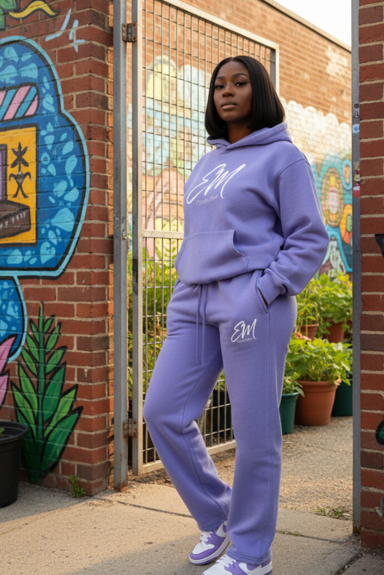 Female model in lavender straight-leg EM tracksuit