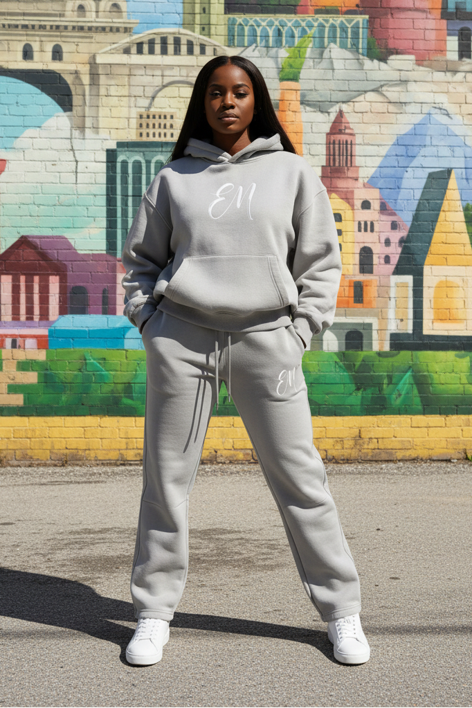Female model in straight-leg EM tracksuit