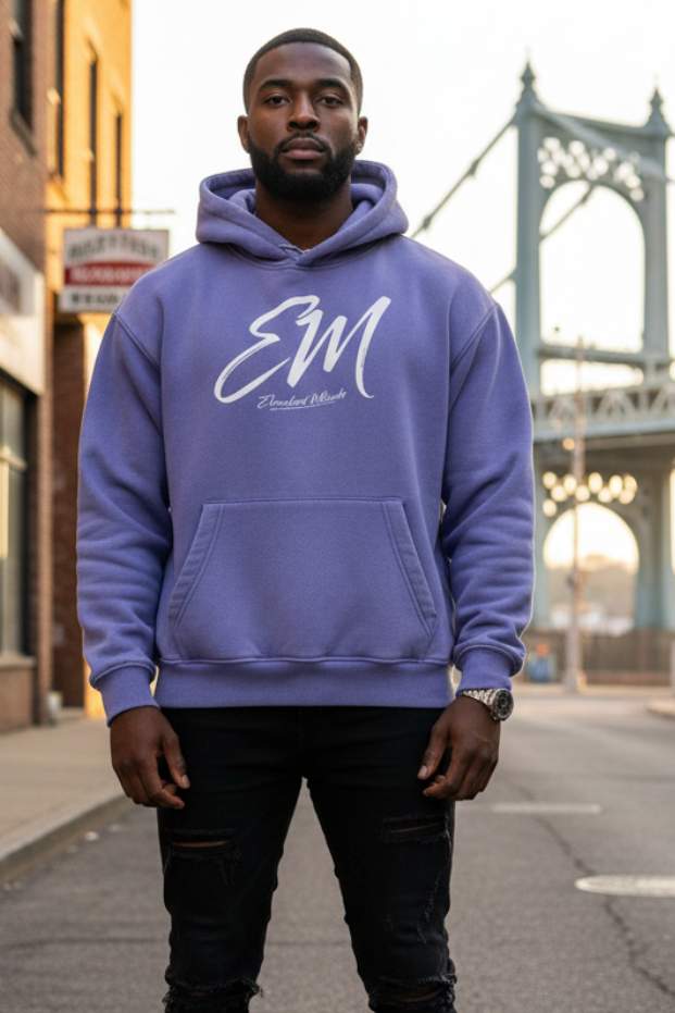 Male model in lavender EM hoodie with high-top sneakers