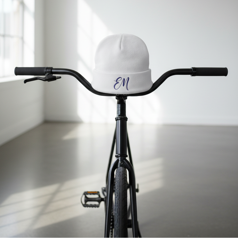 White Elevated Minds beanie bicycle-handlebar display